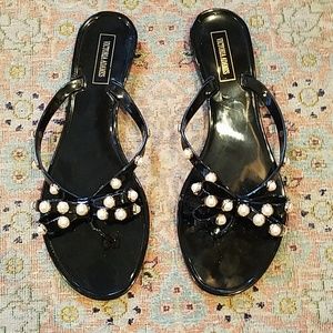 Black bow flip flops